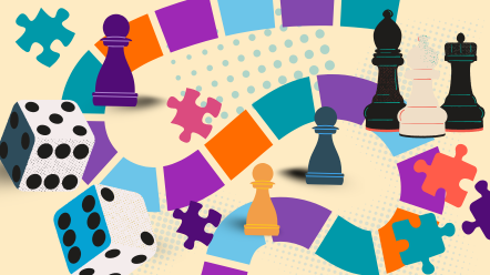 game and puzzle pieces scattered over a colorful game board