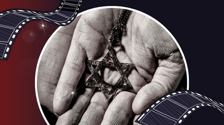 a star of david necklace held in the palm of someone's hand
