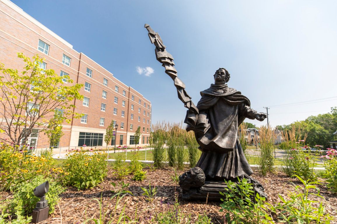Statue of St. Thomas Aquinas by Canadian artist Timothy P. Schmalz outside of the Chapel of St. Thomas Aquinas.